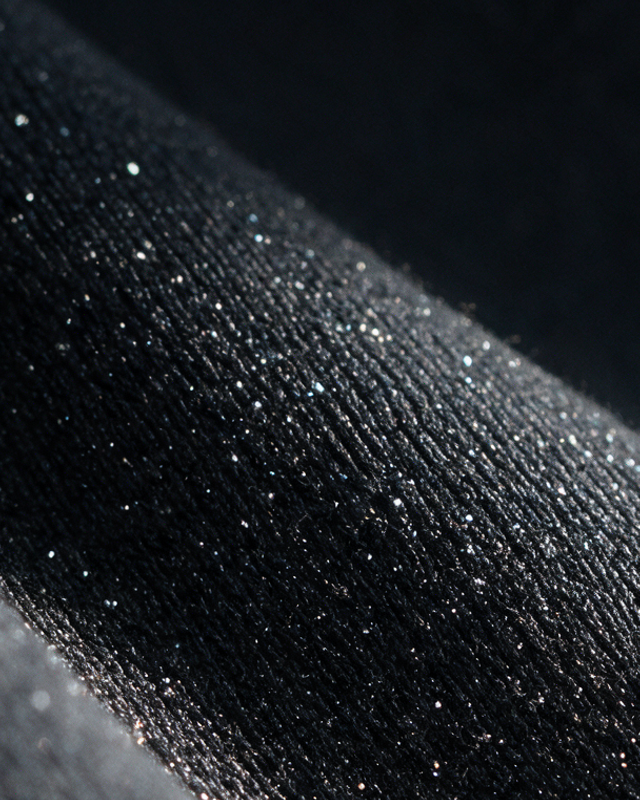 Glitzerstruktur im Stoff